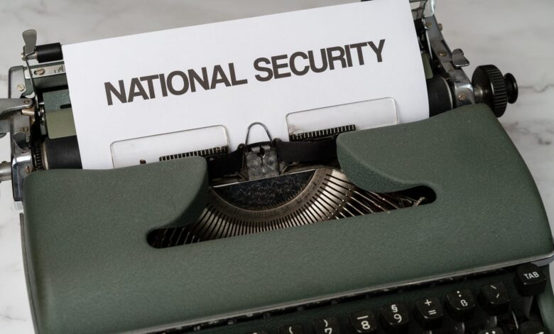 green and white typewriter on white table